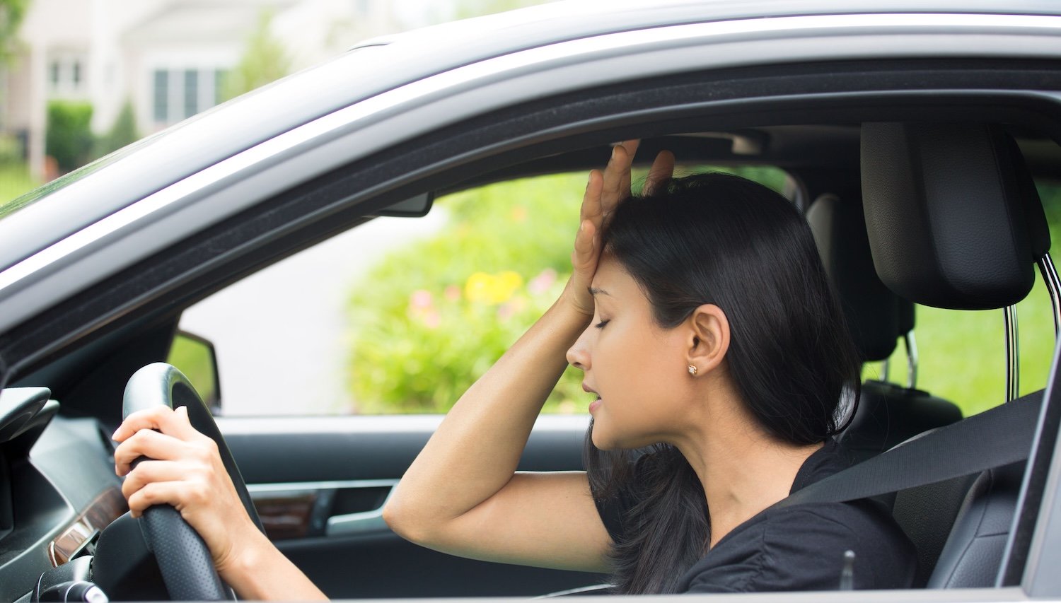 A sad woman who ignored car problem